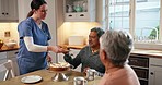Nurse, senior couple and cake in retirement for celebration, party and birthday with tea in home. Elderly man, women and nursing home with dessert, coffee and conversation for sweets, drink and event