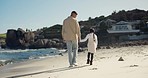 Beach, walking and father holding hands with kid girl, bond and family journey to destination, holiday or vacation house. Sea sand, back and young child with dad love, security and travel together