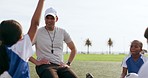 Coach, question and children on field for soccer for game, match and practice outdoors together. Sports, teamwork and kids with hand raised ask for training, exercise and planning for tournament