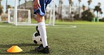 Youth, kid, and alone for soccer with training, goal or practice for competition with back view. Boy, person or player with dedication for mindset, motivation and exercise on field to win in game