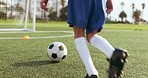 Sports legs, ball and soccer child shooting practice for match contest, target aim or workout drill, routine or cardio. Football field player, goal post and back of kid training strike power on pitch