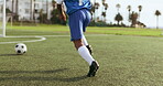 Soccer player legs, ball and sports kid shooting, running and practice target aim, scoring or workout challenge. Football field, goals and back of closeup child training for youth development game