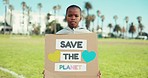 Child, serious face and protest poster for eco friendly, sustainability and saving planet sign. Outdoor, black boy and volunteer for climate change and environment on earth day with support banner