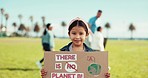 Girl child, poster and climate change in nature with face, vote or opinion in clean environment protest for future. Community service, volunteer kid or cardboard sign for recycling, earth day or help