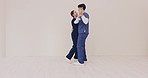 Couple, smile and nurse dancing together in hospital for healthcare, wellness and love. Happy, man and woman moving with energy to music, celebration and mockup space in medical professional clinic