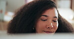 Laptop, face and email with a business black woman reading in her office for communication or networking. Computer, research or information with a young employee working on a report at her desk