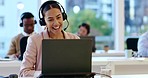 Laptop, customer support and woman agent in a call center for service, help or assistance. Computer, contact us and headset with a happy young consultant in an office for telemarketing communication