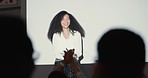 Business, presentation and woman speaker with audience applause or success celebration on space. Podium, spotlight or speech by leader smile for clapping hands crowd in support, training or tradeshow