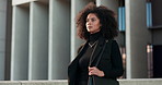 Business, black woman and walking by urban building with thinking and serious for morning travel or journey outdoor. Assertive, person with afro and corporate worker moving to work in city or town 