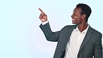 Business, presentation and black man with hand pointing in studio for checklist, info or sign up on blue background. Happy, portrait and African male entrepreneur show guideline, menu or schedule  