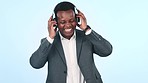Businessman, dancing and listening to music on headphones, relax and fun on break. Happy black business person, streaming radio and audio or song, sound and inspiration or motivation for corporate