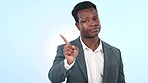 Face, business and black man with no, finger and rejection on a blue studio background with corporate deal. Portrait, African person and employee with warning, hand gesture and feedback with review