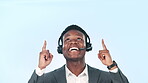 Black man, callcenter consultant pointing up and communication with guide lines or information in studio. Customer service presentation, telemarketing news and CRM with contact us on blue background