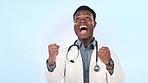 Happy black man, doctor and fist pump in celebration, winning or success against a studio background. Excited African male person, healthcare or medical professional smile in promotion or achievement