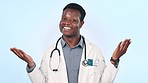 Happy black man, doctor and pointing in advertising or marketing against a studio background. Portrait of African male person, healthcare or medical professional showing options or choice on mockup