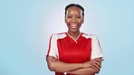 Crossed arms, smile and face of woman athlete in a studio for match, game or sports tournament. Happy, confidence and portrait of young African female soccer player isolated by white background.