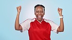 Celebration, happy and face of woman athlete in a studio for match, game or tournament win. Smile, fist pump and portrait of young African female soccer player winner isolated by white background.