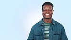 Black man, happy and portrait with casual fashion, confidence and arms crossed in studio on blue background. Mockup, young person and happiness with cool or trendy style with positive attitude  