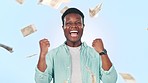 Man, winning and money rain for success, celebration and lottery, bonus or financial freedom on a blue background. Face of excited african person or winner in studio with wow or yes for cash in air