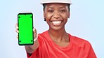 Green screen, smartphone and woman in studio for sports, fitness and wellness on blue background. Mockup space, advertising and person with phone for mobile app, social media and website promotion