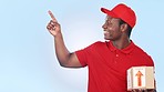 Happy black man, box and pointing for delivery advertising, options or logistics against a studio background. Portrait of African person or courier guy showing list, steps or information of package