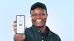 Delivery man, phone screen and portrait of black man with order success isolated in a studio blue background with UX. Smile, happy and worker showing ecommerce mobile app display for service