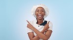 Chef choice, happy black woman and point at palm gesture for cooking news, restaurant comparison or product placement. Hospitality portrait, mockup studio space and baker decision on blue background