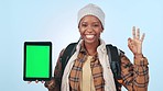 Hiking woman, ok sign and studio with smile on face for mockup, green screen tablet or promo by blue background. African girl, digital touchscreen and feedback with tracking markers for app ux design