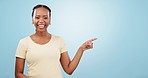 Happy woman, face and advertising promotion in studio of choice, sales deal and offer on blue background. Portrait, african model and pointing to mockup, news and announcement of information about us