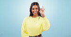 Woman, finger countdown and face on blue background mockup advertising discount, retail sale or marketing. Indian female, hand and smile as portrait in studio for event, celebration or announcement