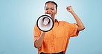 Woman, protest and face with megaphone in studio for freedom, broadcast or human rights rally on blue background. Portrait of angry african model, loudspeaker and speech for change, attention or news