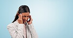 Stress, headache and business woman in studio for burnout, fatigue and challenge isolated on a blue background mockup space. Tired Indian worker massage temple for pain, anxiety and financial crisis