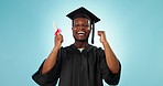 Graduation celebration, education and studio black man excited for university graduate success. Phd diploma, student learning portrait and winner happy for academy progress goals on blue background
