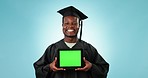 Graduation, tablet green screen and studio black man with university graduate info, college news or online school study. Mockup space, learning portrait and happy tech student on blue background

