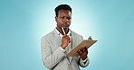 Black man, business and clipboard, thinking of ideas with checklist and innovation on blue background. Insight, inspiration and list with paperwork, corporate employee in studio with project agenda 