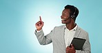 Black man, business telemarketing and pointing with web help and advertising for call center. Studio, blue background and crm communication with customer support and prmo with consultant working
