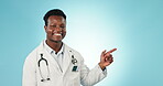 Face, pointing and black man with support, doctor or announcement on a blue studio background. Portrait, African person or medical professional with feedback, opportunity or healthcare with promotion