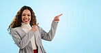 Face, pointing and woman with business, announcement and celebration on a blue studio background. Mockup space, portrait and worker with hand gesture, model and presentation with promotion and winner