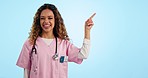 Studio, portrait of happy woman or doctor pointing at steps on healthcare, health insurance or advice. Smile, help and nurse with review, feedback or medical info guide in on blue background mockup.