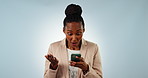 Wow, black woman and phone with surprised for notification, announcement and giveaway winner in studio. Surprised, smartphone and person with disbelief for success news, bonus prize and promotion