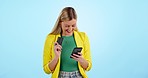 Excited, woman and credit card and phone on a blue background for a payment or ecommerce. Happy, laughing and a young girl with a banking app on a mobile, online shopping discount or sale on the web