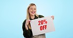 Happy woman, poster and sale for promo deal or discount price against a blue studio background. Portrait of excited female person with billboard or sign for store special, promotion or off on mockup