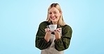 Smile, woman and barista giving coffee cup in studio isolated on a blue background mockup space. Portrait, mug and happy waitress in service to offer hot drink in small business, cafe and restaurant