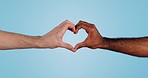 Hands, heart and love sign with diversity, support and vote, gesture or emoji with care isolated on blue background. Together for health, wellness and charity, people with symbol or icon in studio