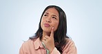 Thinking, confused and woman in studio with questions, choice or solution idea on blue background. Why, doubt and face of Asian female model with with asking emoji, brainstorming or problem solving 