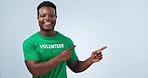 Studio, happy black man or point at volunteering direction, NGO recruitment and waste management notification. Eco friendly recycling, nonprofit help or model presentation portrait on blue background