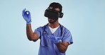 Doctor in studio, virtual reality glasses for surgery and future technology in healthcare innovation. Surgeon, man in medicine or medical professional with ar science, vr software and blue background