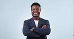 Portrait, professional and black man in studio with smile, arms crossed and corporate career at startup. Businessman, boss or manager with job confidence, pride and happy face on blue background.