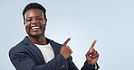 Portrait, pointing and black man in studio with smile, mockup and guide to corporate career opportunity. Businessman, consultant or manager with confidence, presentation and happy on blue background.