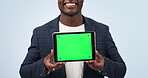 Businessman, hands and tablet with green screen in marketing or advertising against a studio background. Closeup of man or employee showing technology display, app or mockup with tracking markers